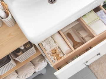 Come organizzare lo spazio sotto il lavandino del bagno?